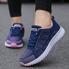 Comfortable women's orthopedic walking shoes with lace-up knit design, offering support and stability for everyday walking.