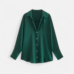 Women's button-front long sleeve blouse with classic fit, shown in a stylish design, perfect for casual or office wear.