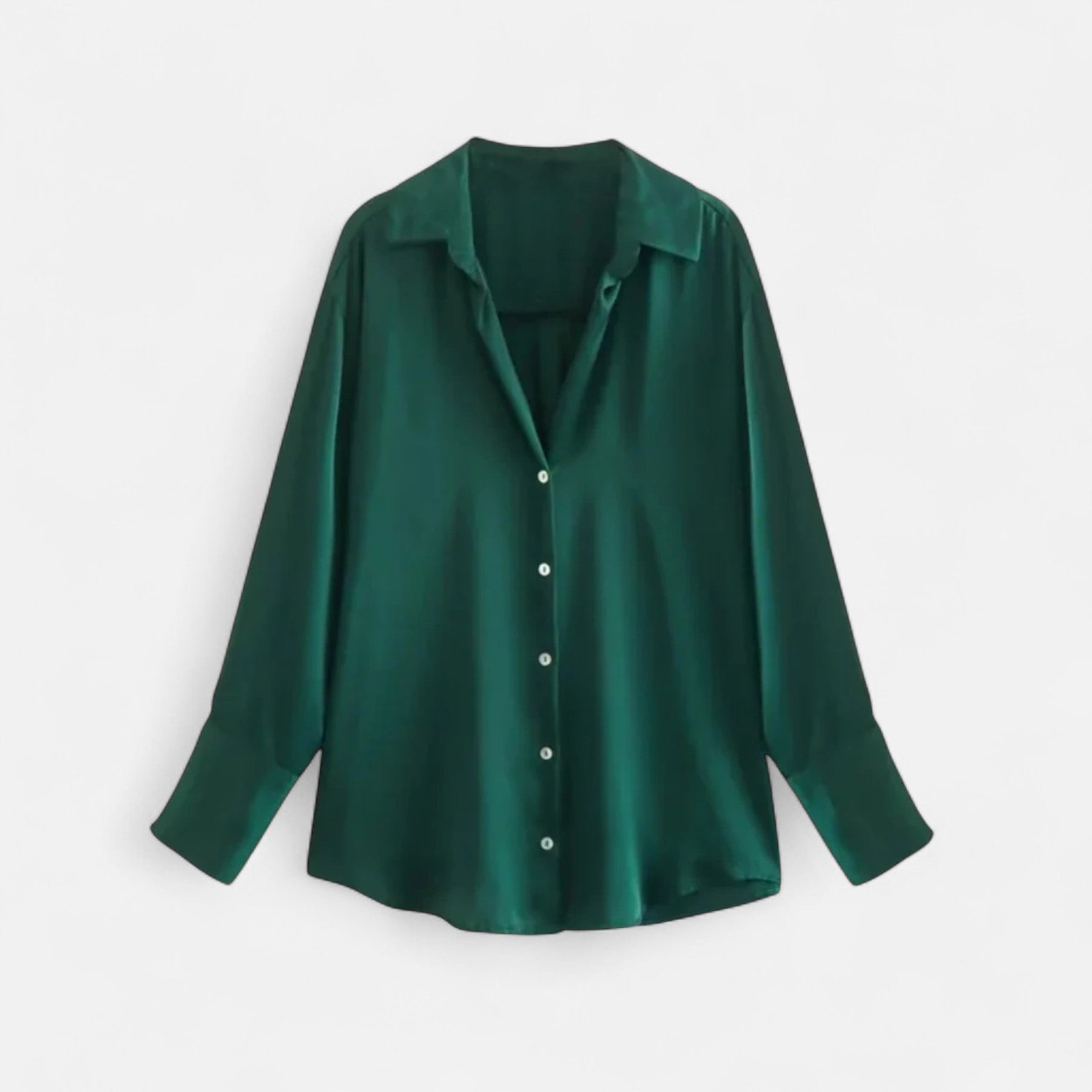 Women's button-front long sleeve blouse with classic fit, shown in a stylish design, perfect for casual or office wear.