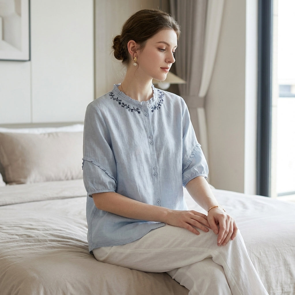 Women's linen ruffle summer blouse, stylish and breathable top perfect for warm weather, featuring feminine ruffle details.