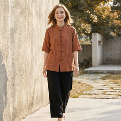 Light blue summer blouse for women with denim pockets, casual top perfect for warm weather and everyday wear.