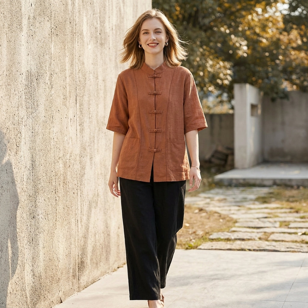 Light blue summer blouse for women with denim pockets, casual top perfect for warm weather and everyday wear.