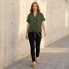 Casual women's summer blouse with V-neck and denim ruffle details, perfect for relaxed, stylish daytime wear.
