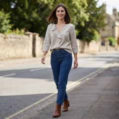 Women’s summer blouse by My Store featuring a V-neck denim top with ruffle details, styled for casual warm-weather wear.