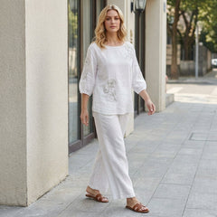 Floral summer blouse for women with puff sleeves, stylish top from My Store, shown in a casual lifestyle setting.