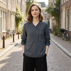 Women's summer blouse by My Store featuring geometric long sleeves, styled with a casual, modern look in a lifestyle setting.