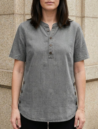 Light gray women's summer denim top with button front, stylish and casual, perfect for warm weather.