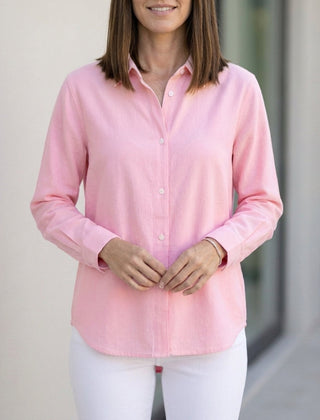 Light pink women's linen summer blouse with button front, stylish and breathable top for warm weather.