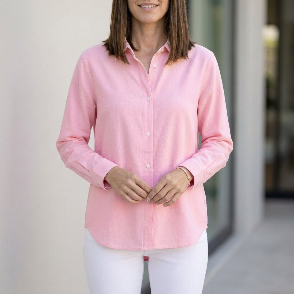 Light pink women's linen summer blouse with button front, stylish and breathable top for warm weather.