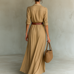 Long sleeve maxi dress for women, stylish and flowing, featuring a fitted waist and elegant design in a solid color.