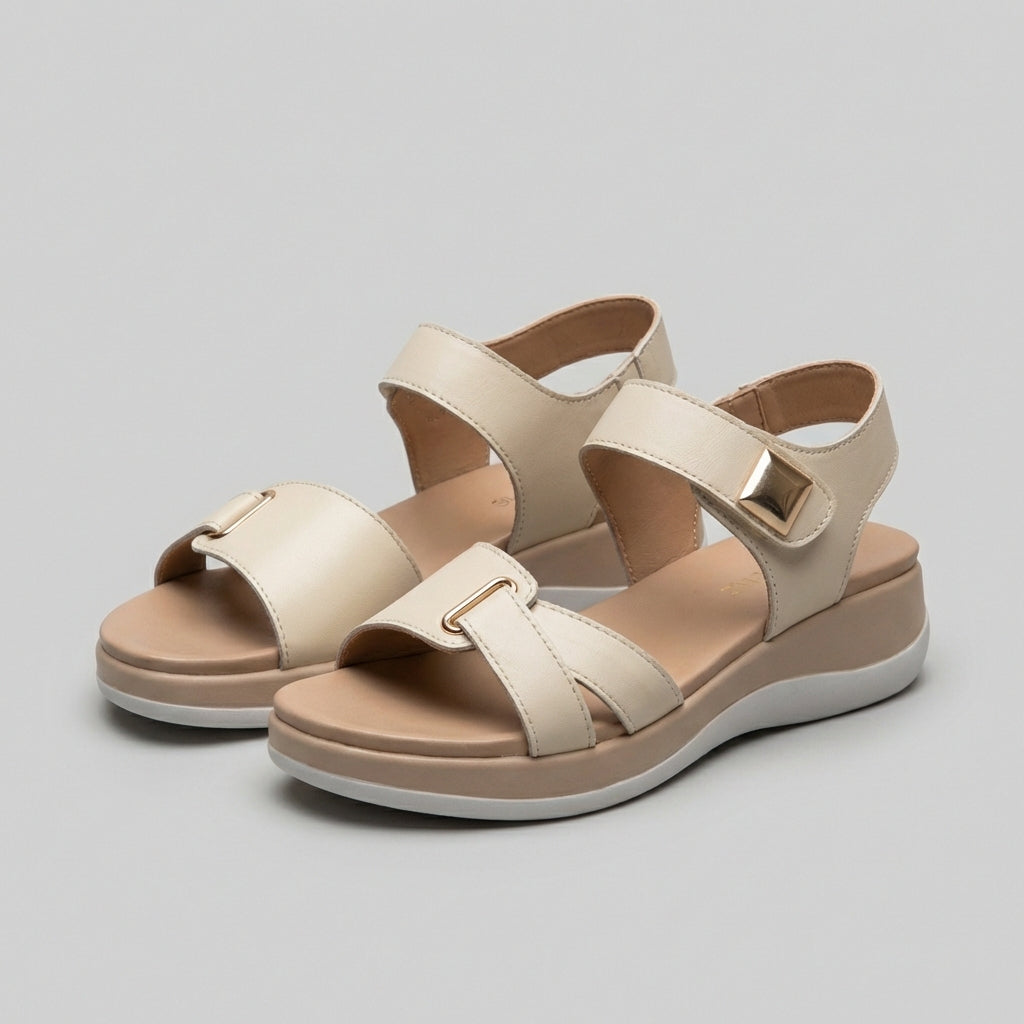 Orthopedic platform strap sandals with buckle detail, featuring supportive design and stylish comfort for everyday wear.