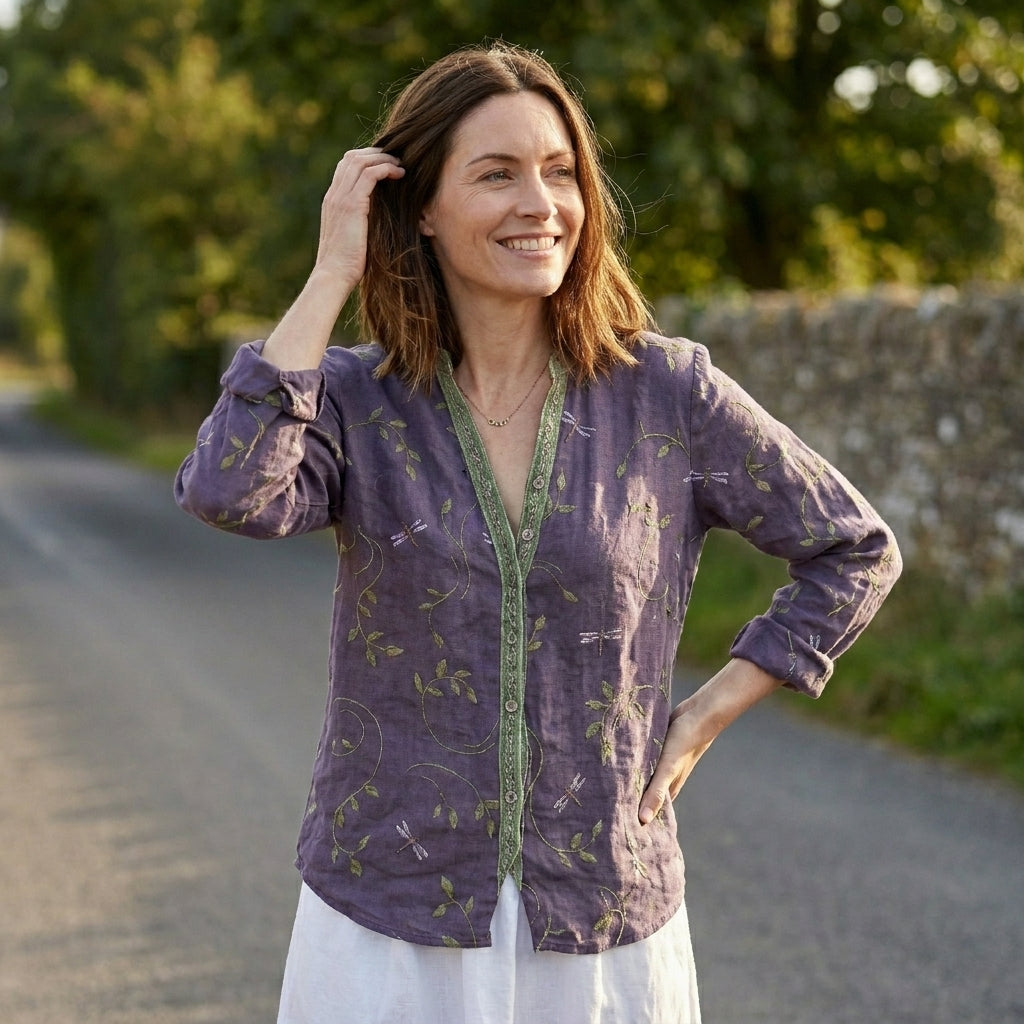 Floral V-neck long sleeve linen blouse for women, styled on a model, casual summer top, breathable lightweight fabric.