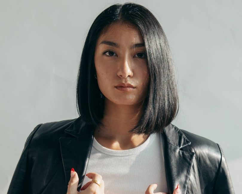 Women-wearing-leather-jacked-black-with- white-shirt
