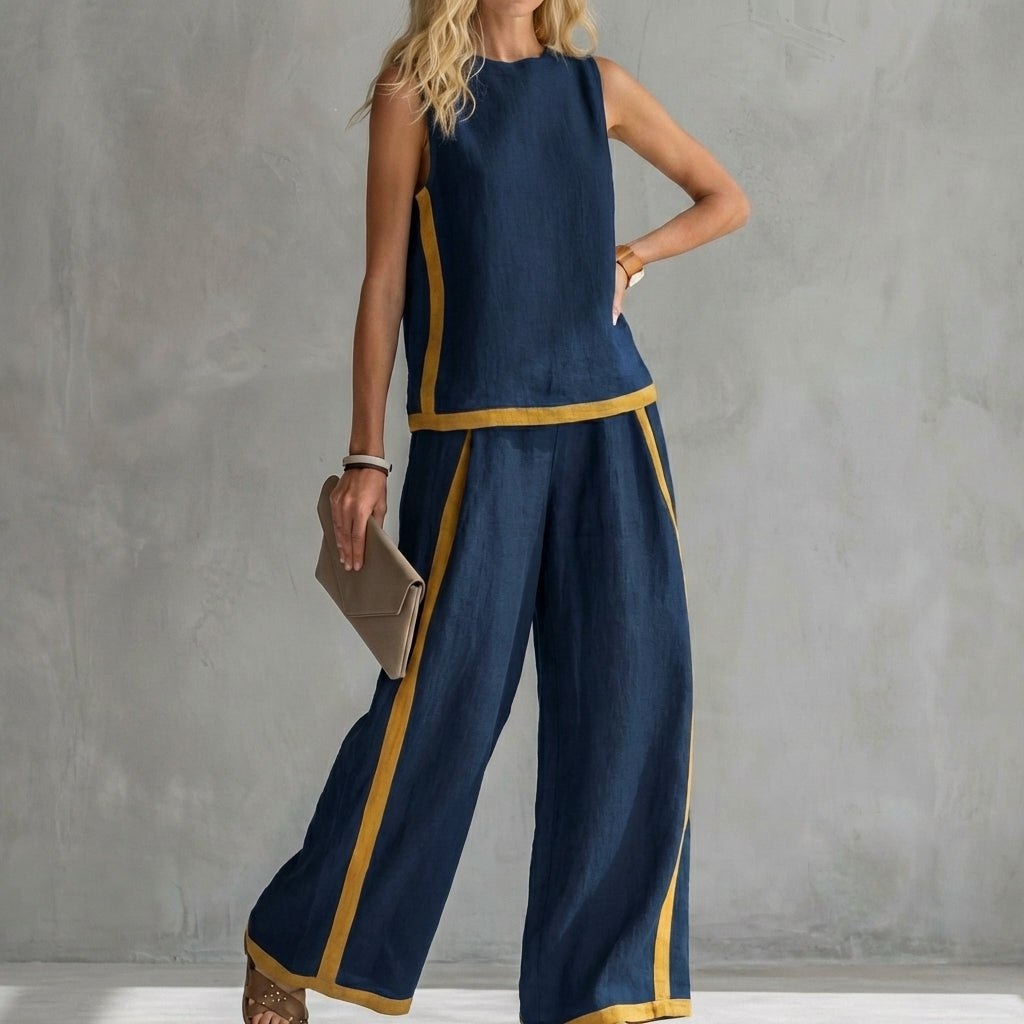 Navy blue women's two-piece slit co-ord set by Tammy Bradley, featuring a stylish top and matching skirt.