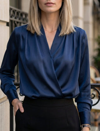 Navy blue women's summer blouse with V-neck and long satin sleeves, casual style, shown on a model.