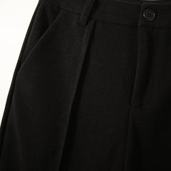 Women’s wool tapered trousers by My Store, stylish and comfortable merino wool pants for women, shown in a natural pose.