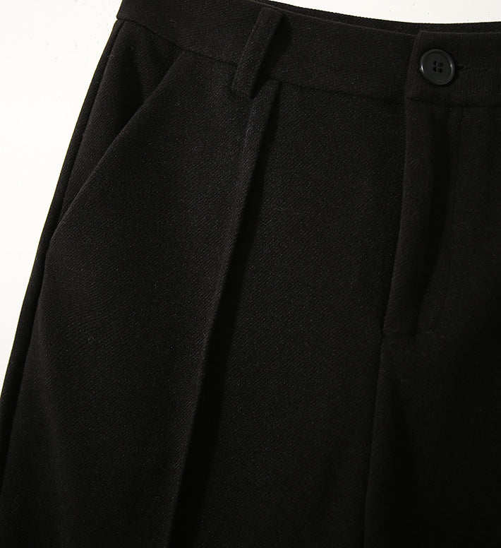 Women’s wool tapered trousers by My Store, stylish and comfortable merino wool pants for women, shown in a natural pose.
