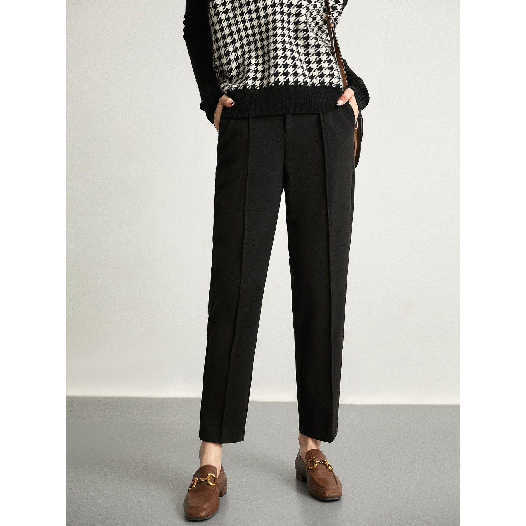 Women's wool tapered trousers by My Store, made from soft merino wool, featuring a classic fit and tapered leg design.