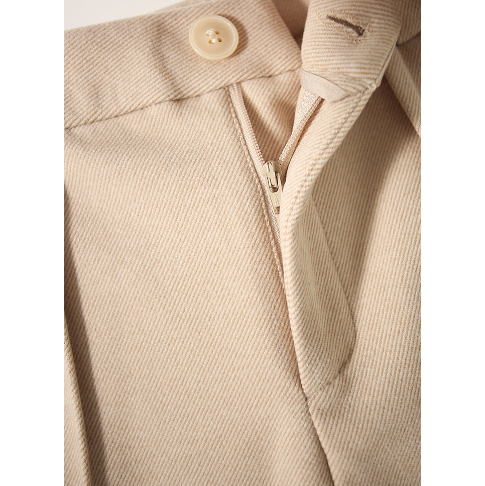 Women’s wool tapered trousers made from merino wool, stylish and comfortable pants for women with a tailored fit.