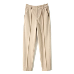 Women's wool tapered trousers by Merino, stylish and comfortable pants for women, shown in a natural pose.
