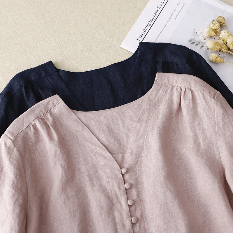 Light beige V-neck linen summer blouse for women with short sleeves, stylish and breathable top for warm weather.
