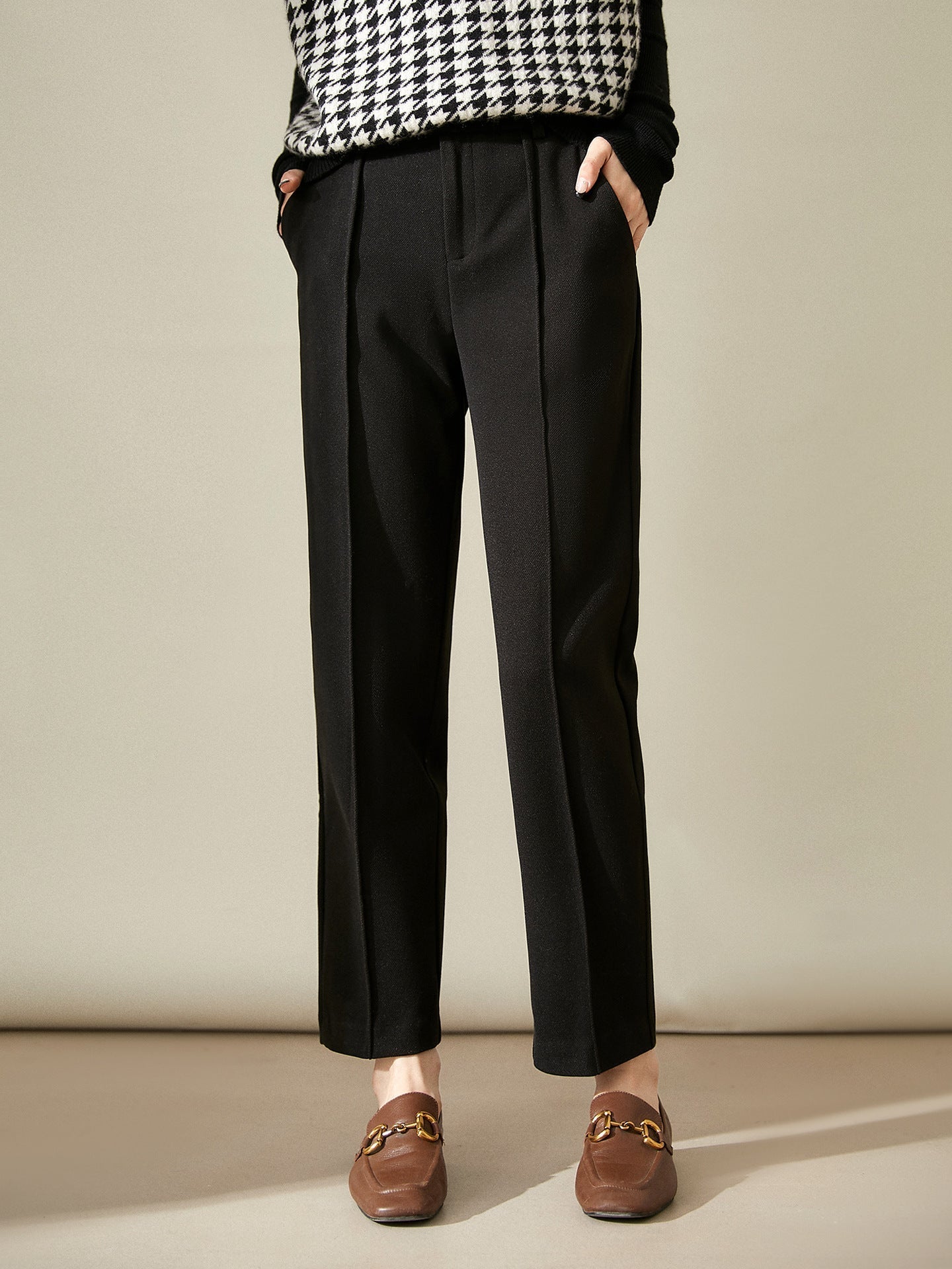 Women's Merino wool tapered trousers, stylish and comfortable pants for women, showcasing a tailored fit in neutral color.