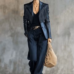 Black faux leather blazer with tassel detail, notch lapel, tailored fit, stylish jacket for women.