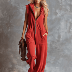 Raspberry red cotton hooded zip-front jumpsuit for women, featuring a comfortable fit and stylish design.