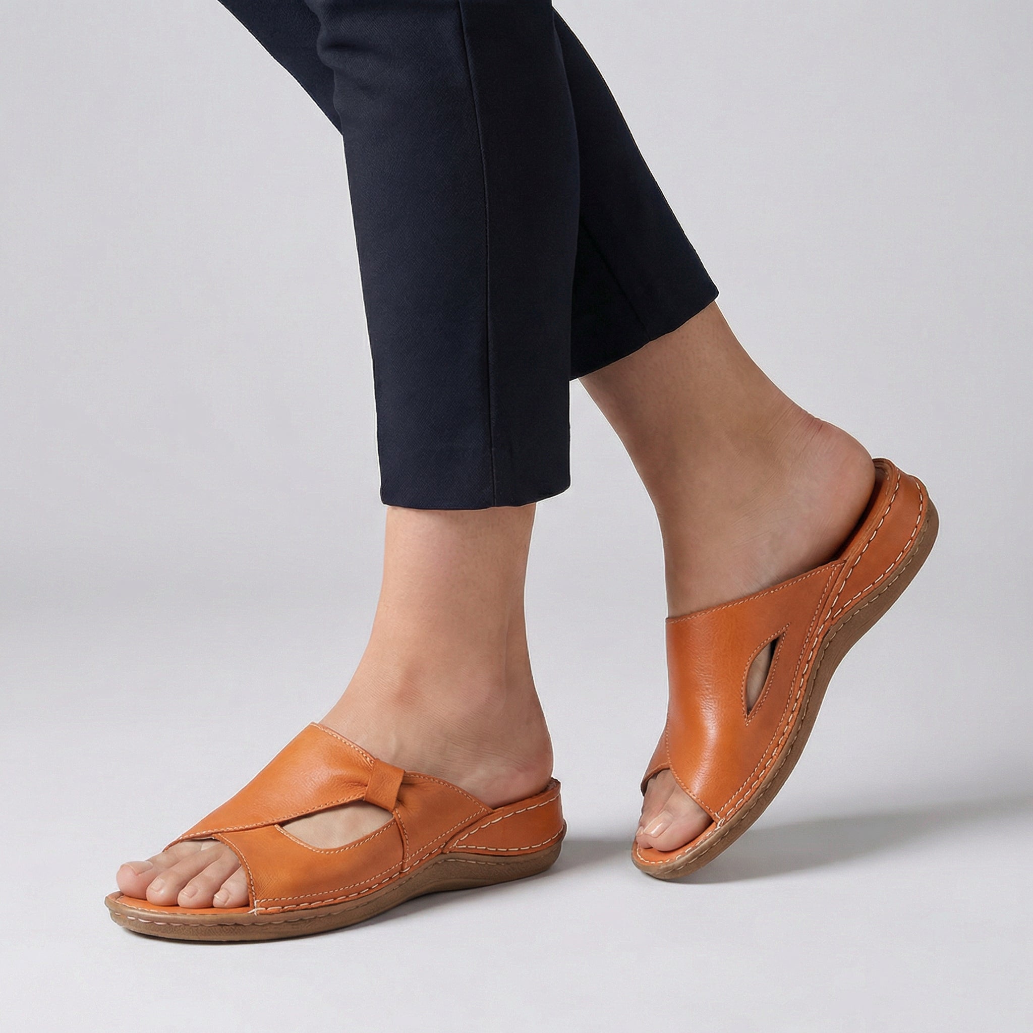 Orange open-toe slide sandals for women by Tammy Bradley, featuring a stylish and comfortable design.