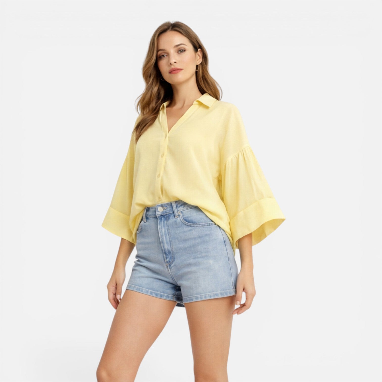 Lightweight women's summer blouse with loose fit and relaxed style, perfect for vacation wear, shown in oversize fit.