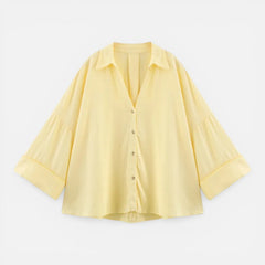 Lightweight women's summer blouse with loose fit and oversized design, perfect for vacation and casual wear.