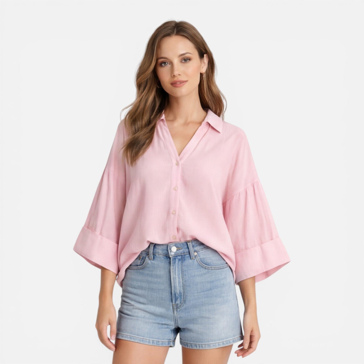 Lightweight women's summer blouse with a loose fit, ideal for vacation, shown in an oversized style with soft fabric.
