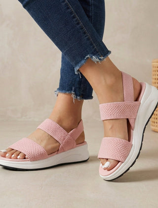 Pink orthopedic women's sandals with adjustable straps and flowy design, stylish and comfortable for everyday wear.