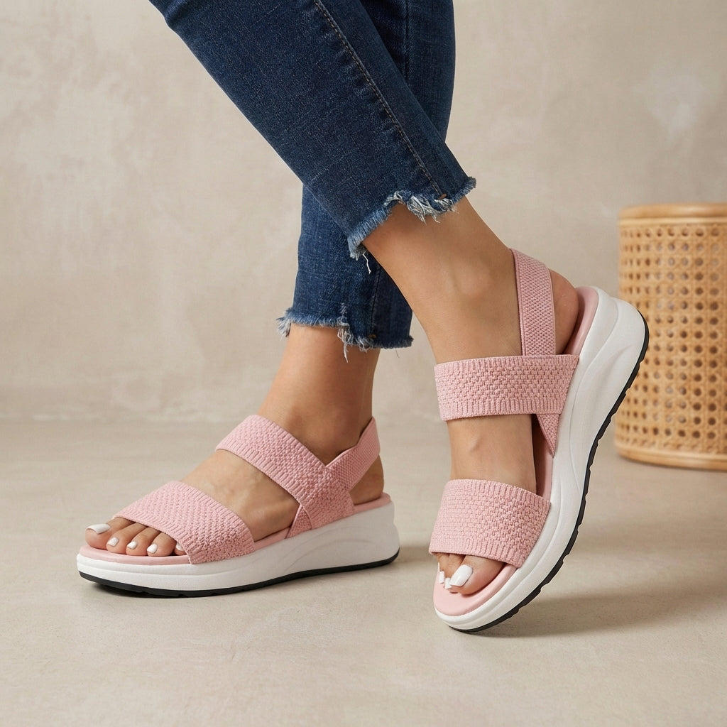Pink orthopedic women's sandals with adjustable straps and flowy design, stylish and comfortable for everyday wear.