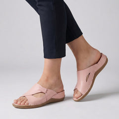 Pink open-toe slide sandals for women by Tammy Bradley, featuring a stylish and comfortable slip-on design for warm weather.