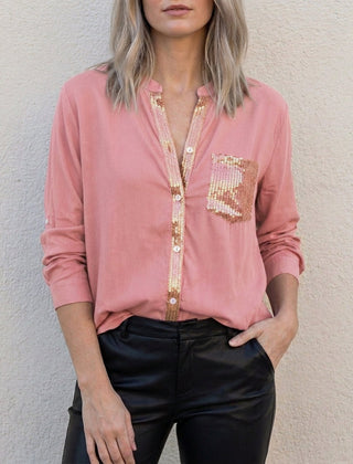 Pink women's summer blouse with V-neck and denim button front, stylish top for warm weather.