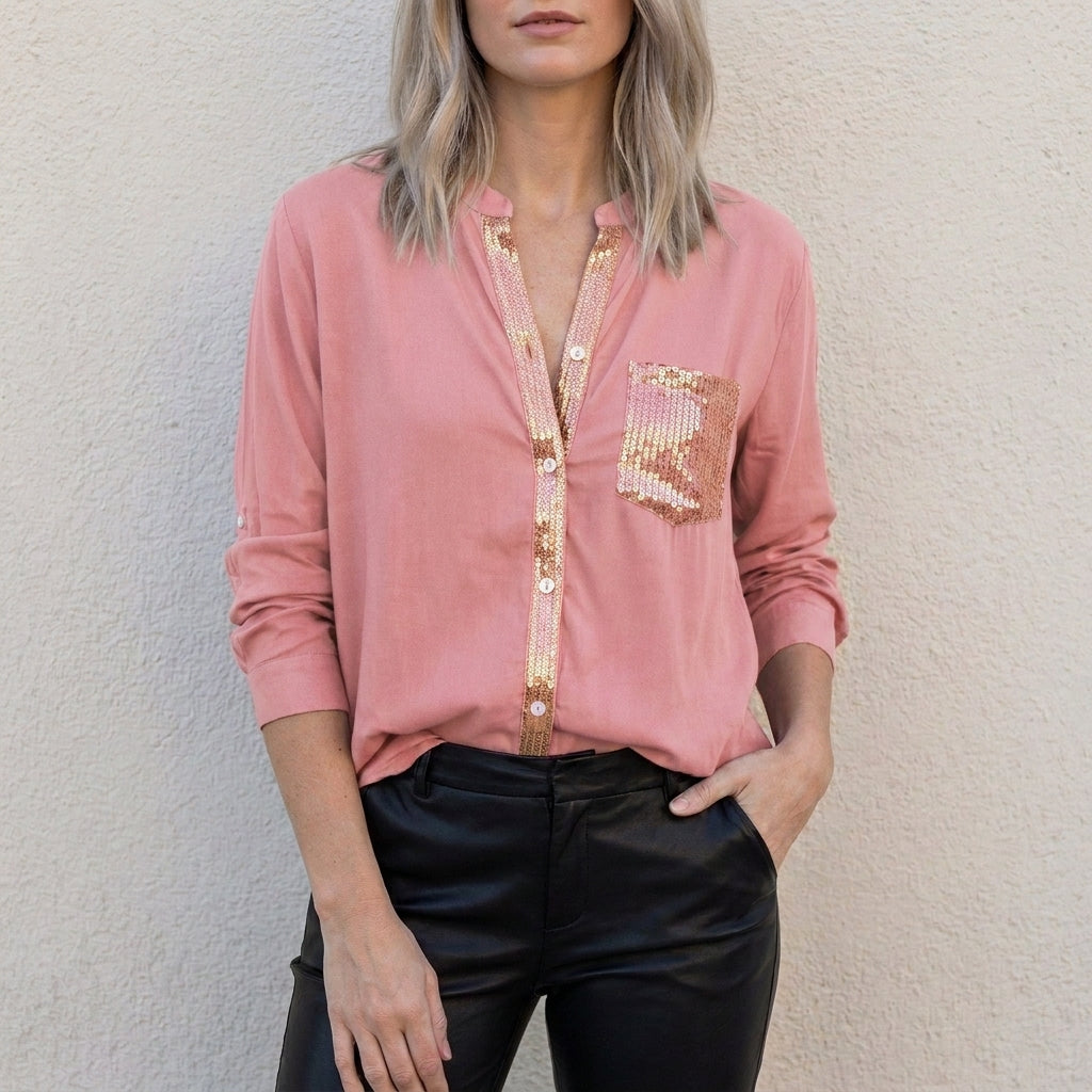 Pink women's summer blouse with V-neck and denim button front, stylish top for warm weather.