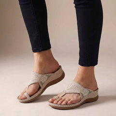 Pink orthopedic floral embroidered wedge sandals for women with supportive design and decorative flower embroidery.