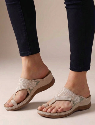 Pink orthopedic floral embroidered wedge sandals for women with supportive design and decorative flower embroidery.