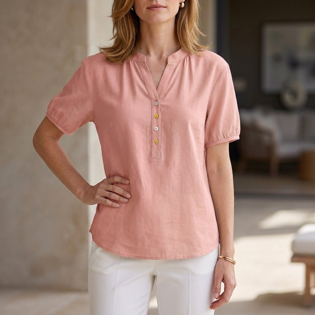 Pink women's summer blouse with puff sleeves, denim fabric, button front, lightweight top for warm weather.