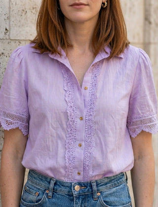 Purple women's summer blouse with V-neck, short lace sleeves, lightweight and stylish top for warm weather.