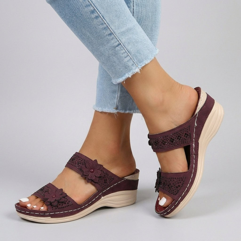 Red floral strap wedge heeled sandals for women by Tammy Bradley, featuring a stylish design and comfortable heel height.