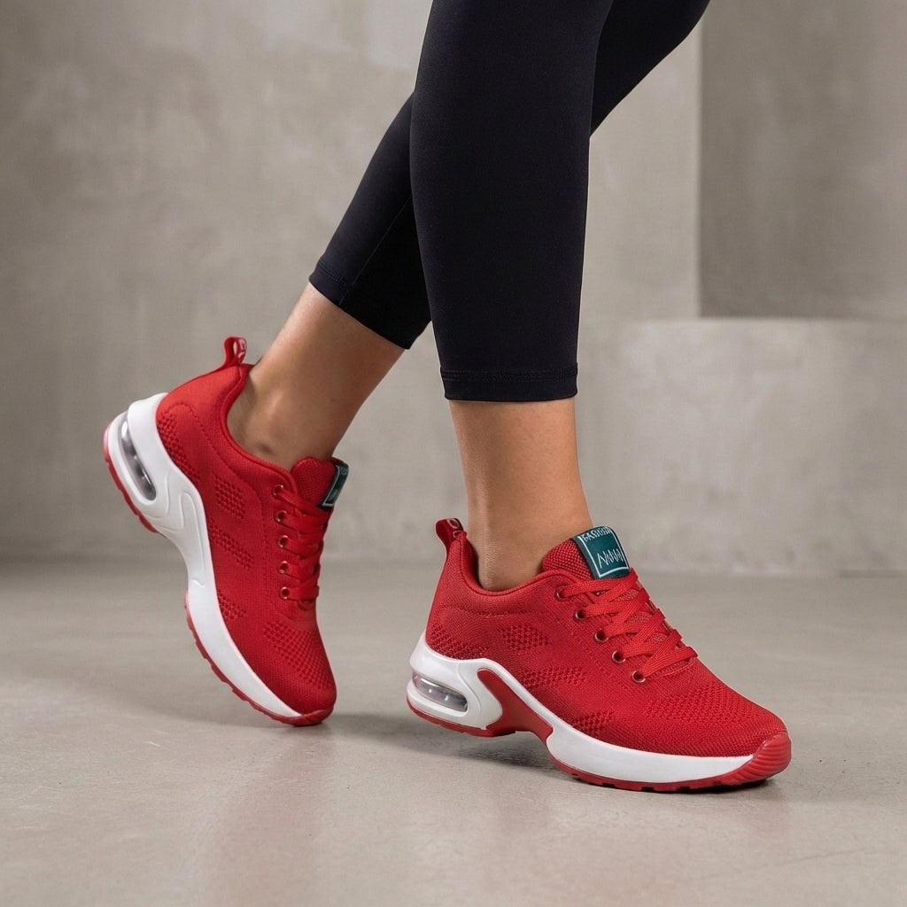 Red Tammy Bradley women's knit sneakers showing their comfortable, stylish design with breathable knit fabric and casual sole.