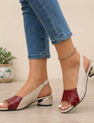 Red embossed peep toe colour block slingback block heel sandals for women with stylish straps and a chunky heel.