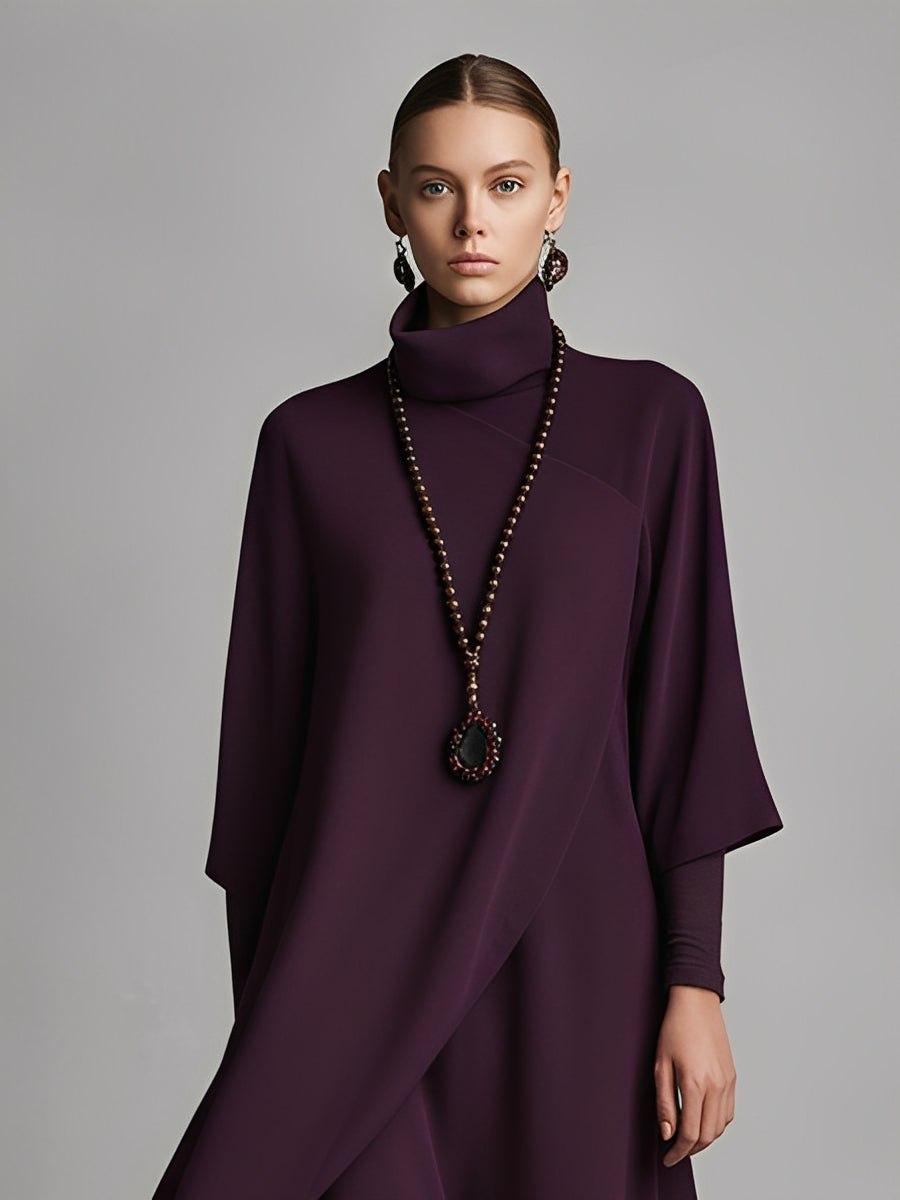 Red cotton turtleneck maxi dress for women by Tammy Bradley, featuring a flowing silhouette and long sleeves.