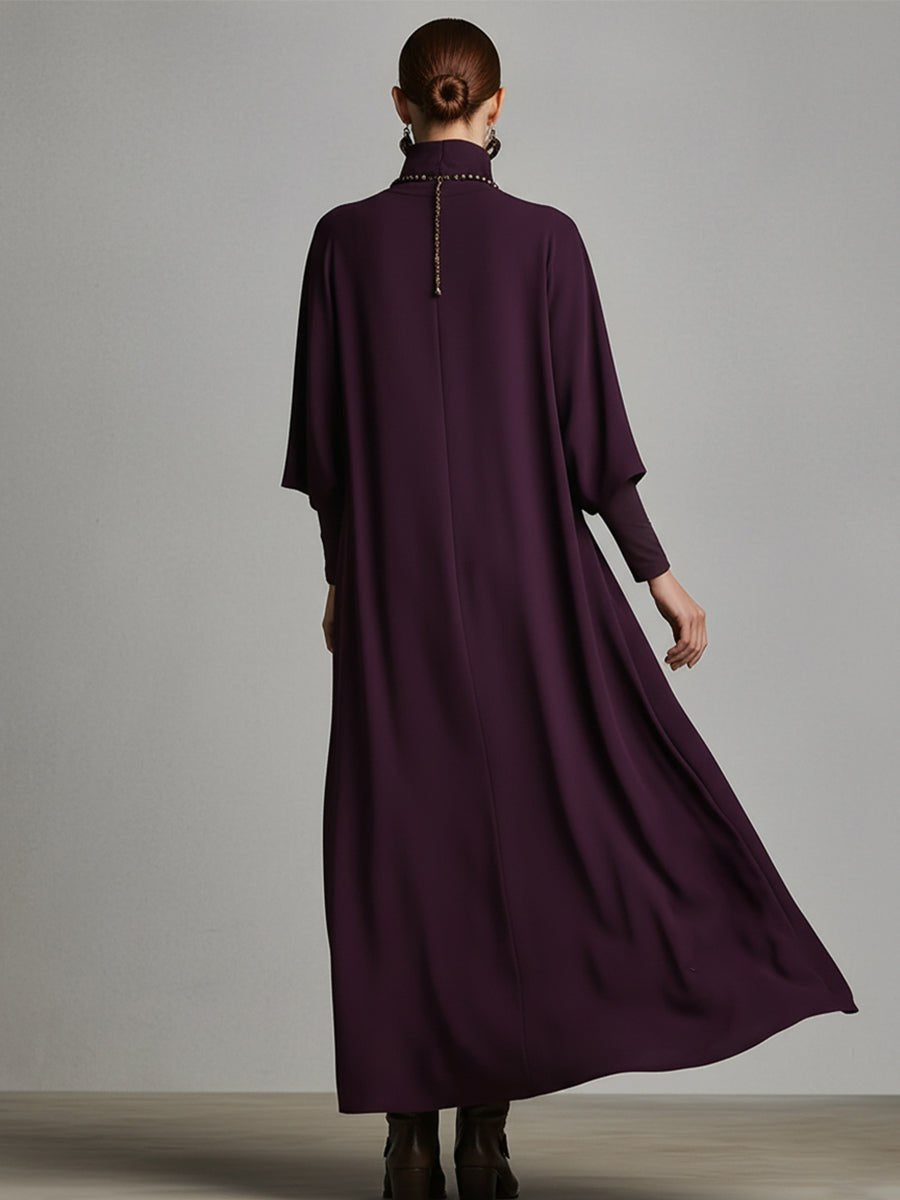 Red cotton turtleneck maxi dress for women by Tammy Bradley, featuring a fitted bodice and flowing skirt for elegant evening wear.