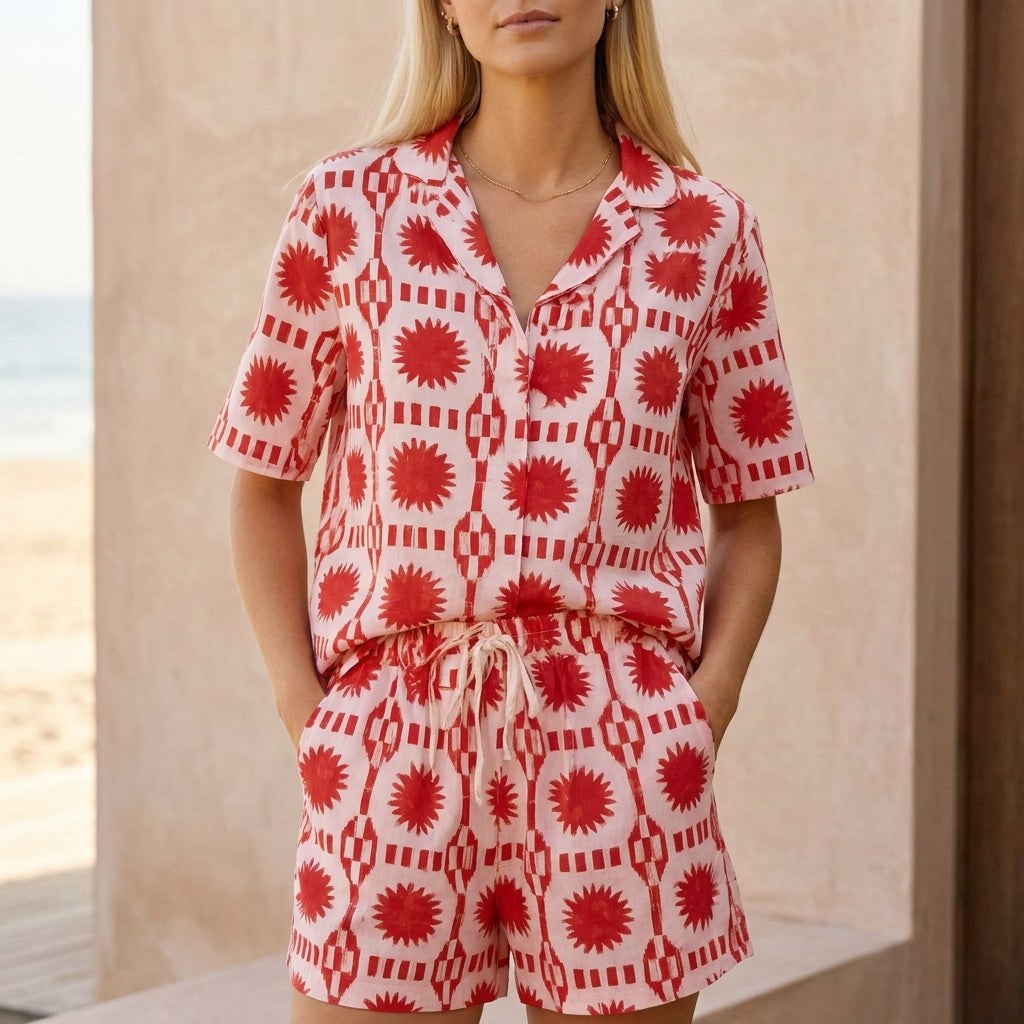 Red women's geometric high-waist two-piece set by Tammy Bradley, featuring a stylish crop top and matching high-waist pants.