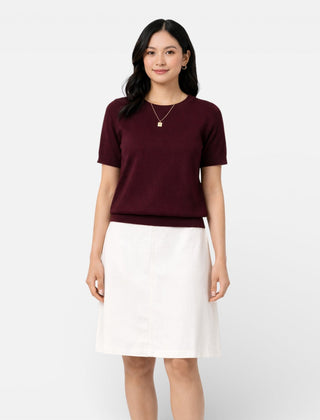 Red women's knit top made from wool blend, featuring a comfortable classic fit and long sleeves, ideal for casual wear.