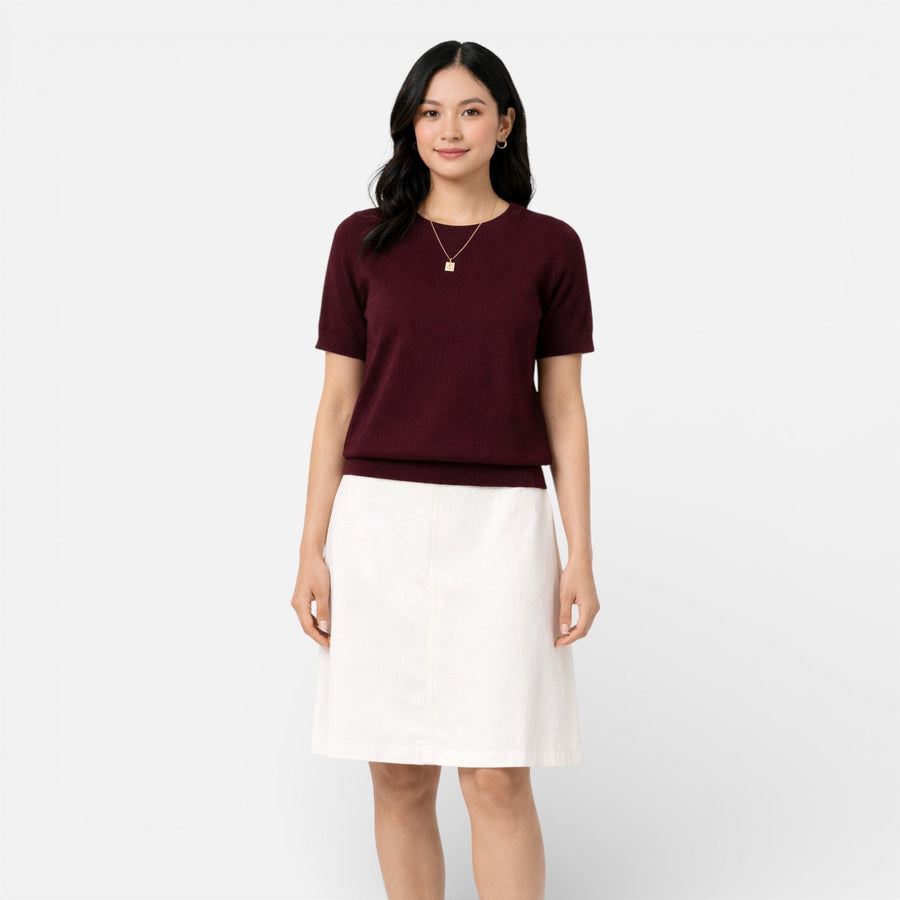 Red women's knit top made from wool blend, featuring a comfortable classic fit and long sleeves, ideal for casual wear.