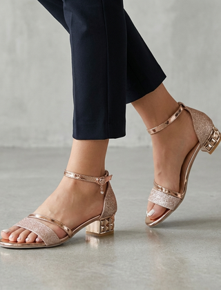Rose gold metallic block-heel ankle-strap sandals for women by Tammy Bradley, featuring a stylish and comfortable design.
